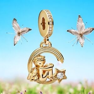 NWOT Little angel sitting on a shooting star charm, yellow gold plated